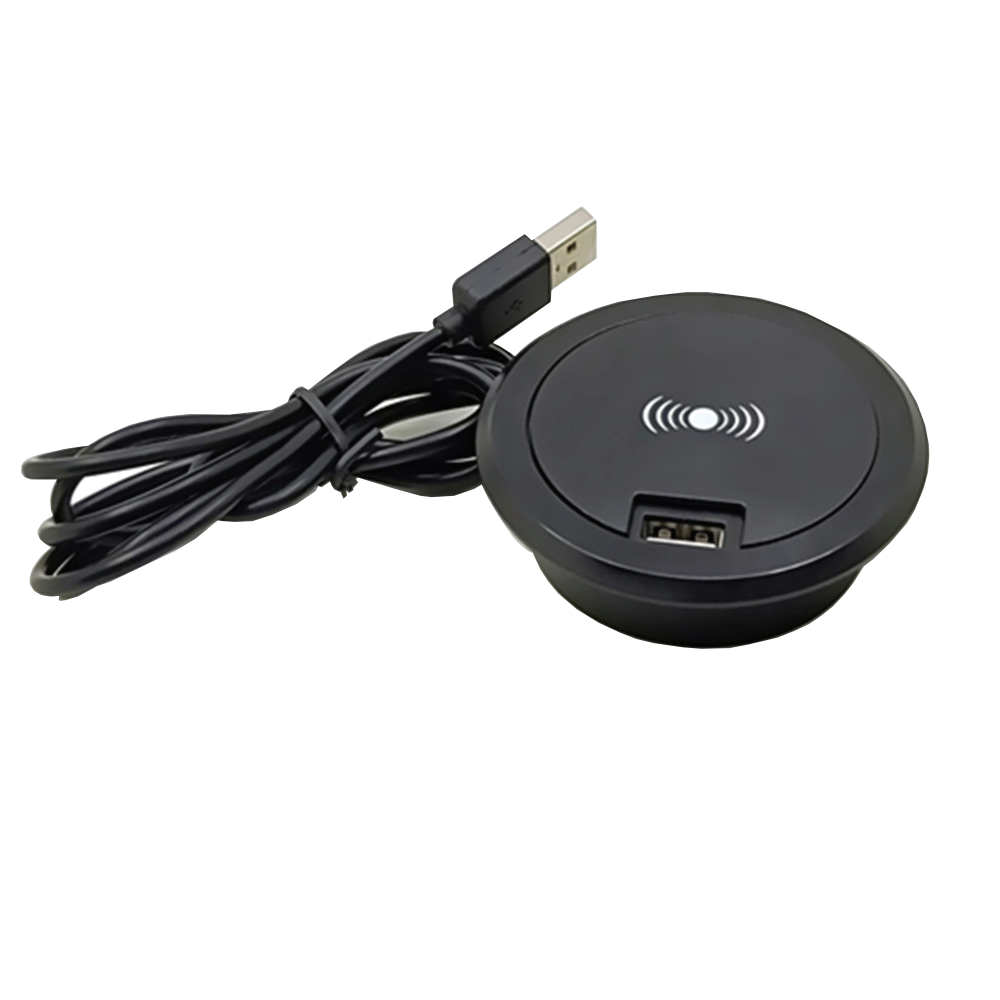 Встраиваемое в мебель устройство круглой формы с Qi (беспроводной) зарядкой и USB выходом для подключения кабеля.