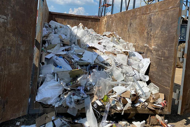 Контейнер 27 м3, загруженный мусором